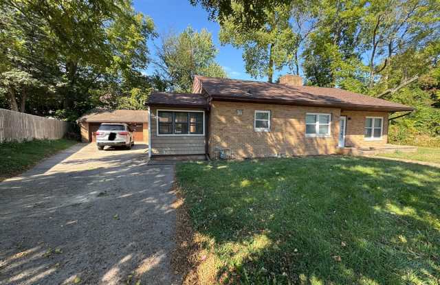 Large Moline Home with 3-Car Garage, Privacy, and Plenty of Space