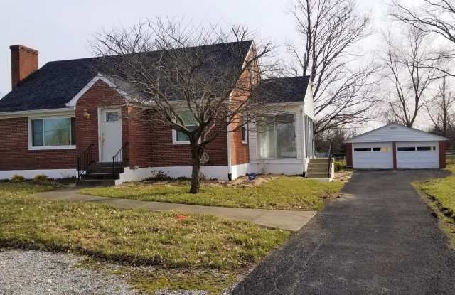 CHECK ME OUT! 3 Bedrooms, 2 Full Baths, Brick Home with 2 Car Garage, LARGE Back Yard, Unfinished Basement! - 5501 Billtown Road, Jefferson County, KY 40299
