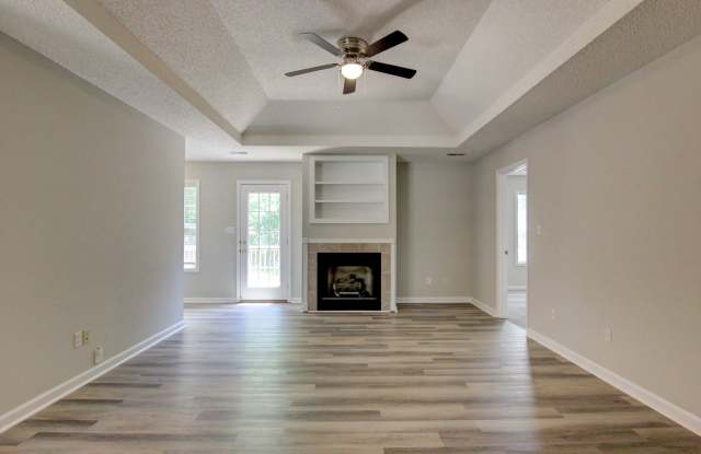 Stunning Brick Front Home With Fireplace And Hardwood Flooring In Sango Area