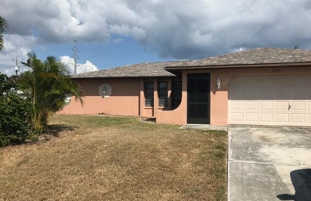 629 SW Santa Barbara PL - 629 Southwest Santa Barbara Place, Cape Coral, FL 33991