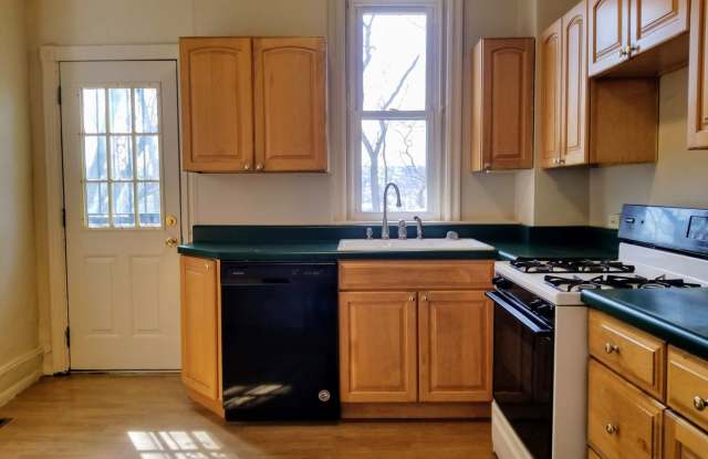 Photo of Spacious Three Bedroom in Oakland! Decorative Fireplaces  Lots Of Natural Light! Call Today!