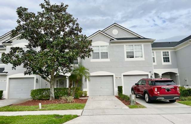 MOVE IN NOW! Beautiful 3 bed 2.5 bath townhome with large screened in back porch  1 car attached garage!! In man gated Spring Isle/Avalon Park!! photos photos