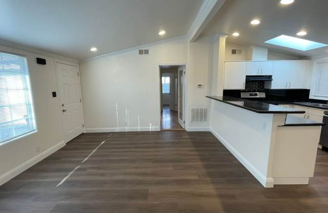 Beautiful 3 bedroom 2 bathroom home, updated kitchen  baths plus 1 car garage!