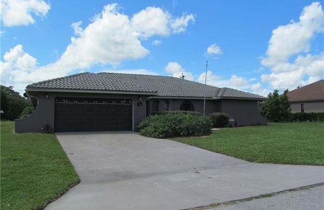 312 Inman ST - 312 Inman Street, Lehigh Acres, FL 33936