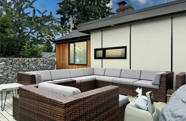 Remodeled 3 bdrm home on a large lot with 500 sq ft wrap around deck!