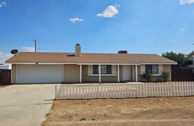 Charming 3-Bedroom Home with Spacious Backyard  2-Car Garage