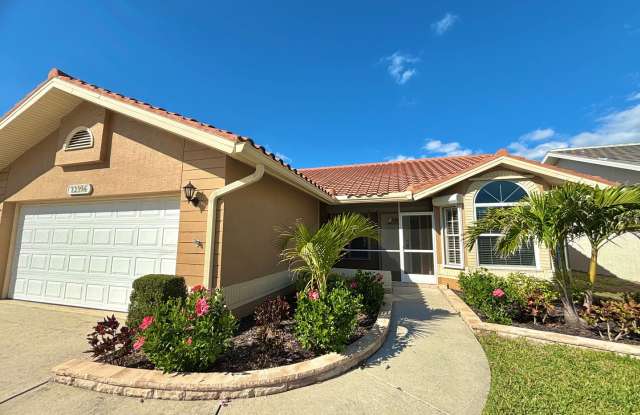 Charming 2 Bed, 2 Bath Home with Den in Fort Myers Golf Course Community With In Unit Washer/Dryer, Community Pool  More!