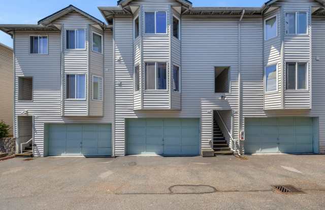 Spacious Townhome with 2 Car Garage