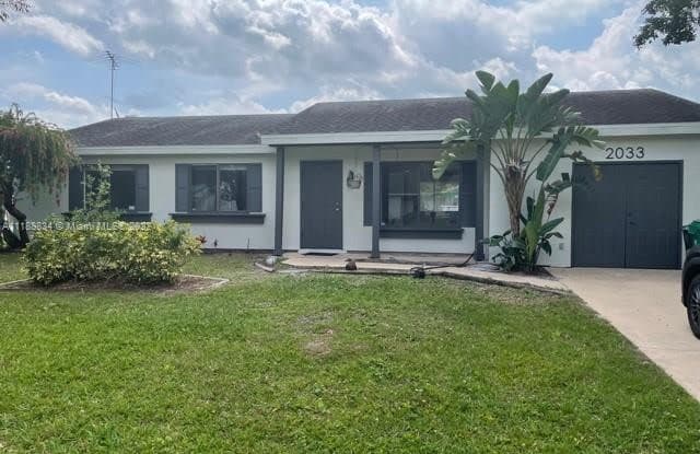 2033 SE Hideaway Cir - 2033 Southeast Hideaway Circle, Port St. Lucie, FL 34952