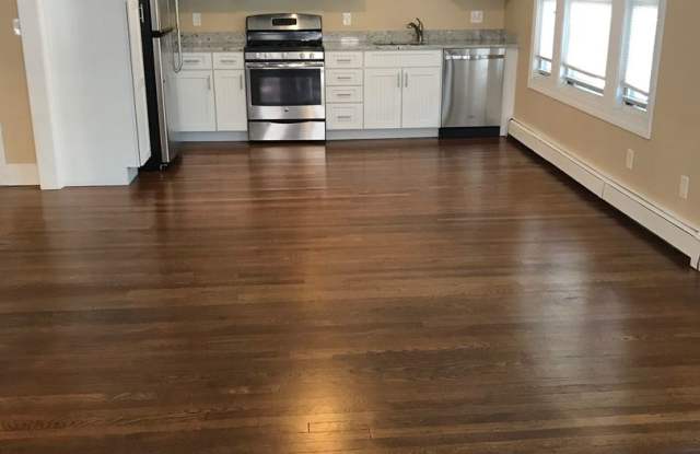 NO FEE LUXURY DUPLEX near T w 2 FREE Parking spaces and NO BROKER FEE.  Laundry in Unit, Central A/C, Near T