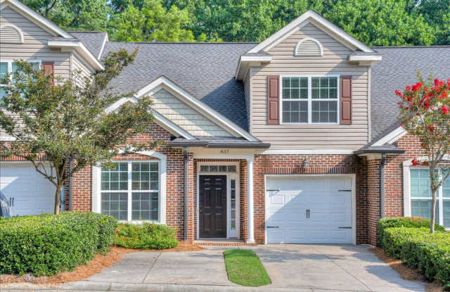 EXECUTIVE TOWNHOME IN GATED COMMUNITY