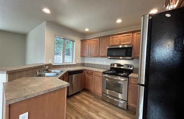 Photo of Move-In Ready! 3 Beds 2.5 Baths Townhome with Stainless Steel Appliances, W/D Hookups, and Gas Forced Central Heating/AC!