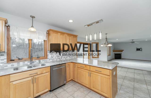 4-Bedroom Home in NE Rochester - 1368 Rocky Creek Dr NE