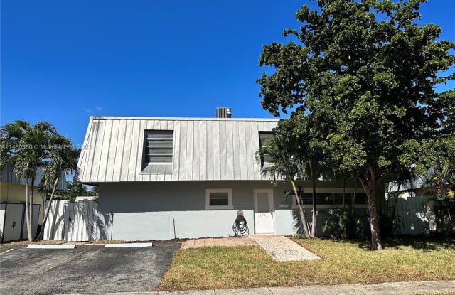 1361 NE 40th Pl - 1361 Northeast 40th Place, Oakland Park, FL 33334