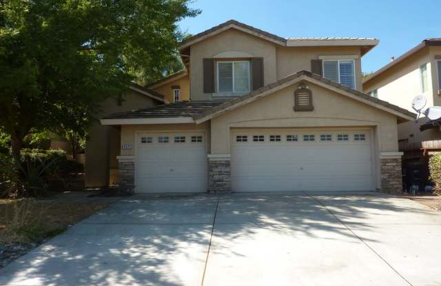Photo of Large Two Story Home with Bonus Room, Covered Patio