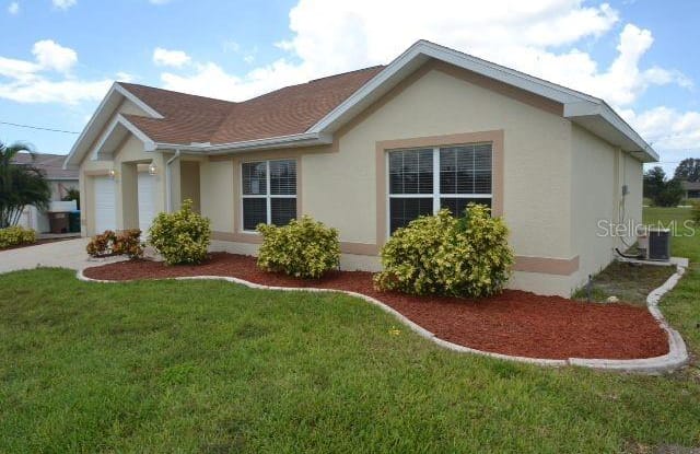 306 NW 15TH PLACE - 306 Northwest 15th Place, Cape Coral, FL 33993