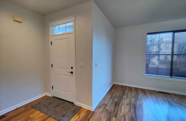 Photo of Beautiful 3x2.5 with fenced patio and upstairs bonus area