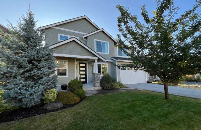 Photo of Bonney Lake area - 5 bedroom plus Den and 3 baths, AC and more - Available NOW!
