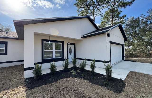 702 MARION OAKS MANOR