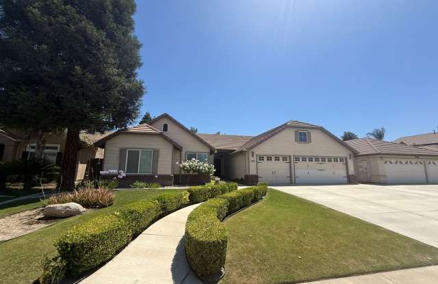 Beautiful 4 Bedroom, 3 Bathroom Home with Enclosed Patio & Stunning Backyard