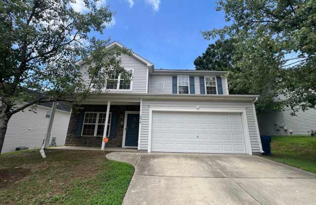 Charming 4BD, 2.5BA Durham Home with a Bonus Sun-Room & Fenced In Yard Only 10 Minutes Away from Downtown Durham