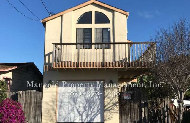 Photo of Charming Two-Story 2-Bed 2-Bath Home with Wrap-Around Balcony  Hardwood Floors in Seaside