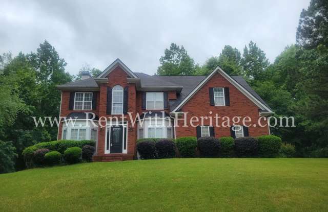 Gorgeous 3-Story Brick Home / 2 Fireplaces / Full Finished Basement / Chapel Hill Schools