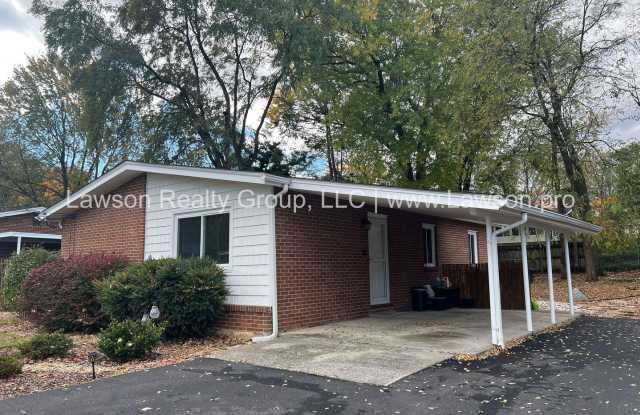 Charming Brick Ranch with Beautifully Landscaped Yard and Attached Carport