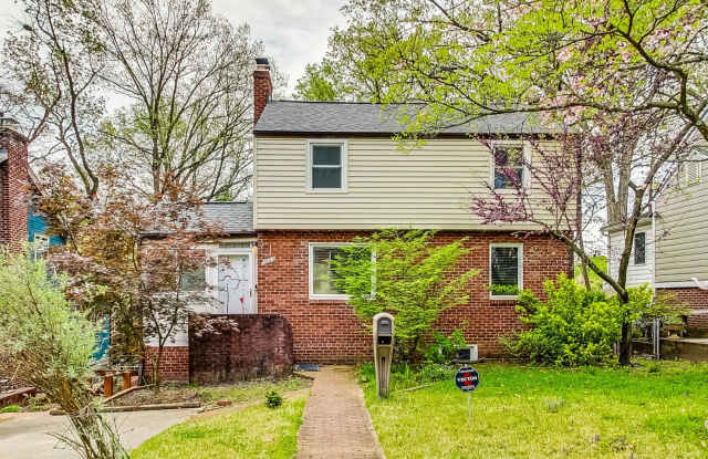 Updated 2 Bedroom, 2 Bath Single Family tucked away in 6000 sf of green space! - 5833 Dewey Street, Cheverly, MD 20785
