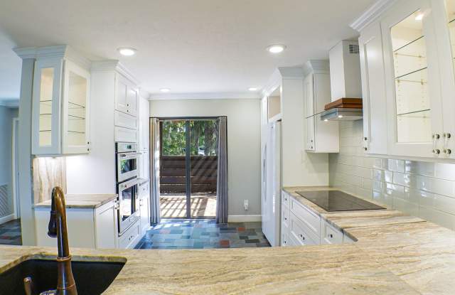 RARE ON MARKET , 2+den 2 1/2 bath overviewing a lake behind bell tower