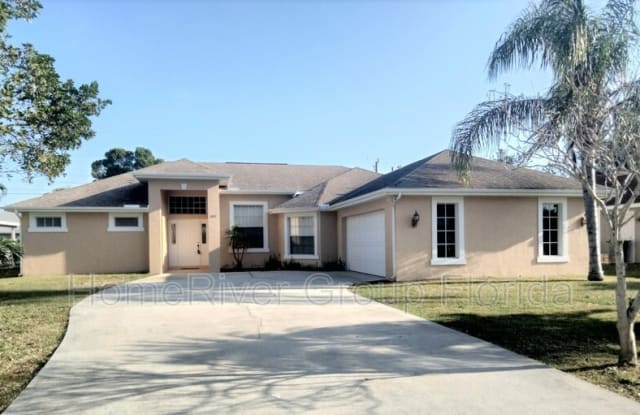 2497 SE Dogwood Ave - 2497 Southeast Dogwood Avenue, Port St. Lucie, FL 34952