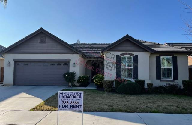 Beautiful Northwest Visalia home with solar and yard care