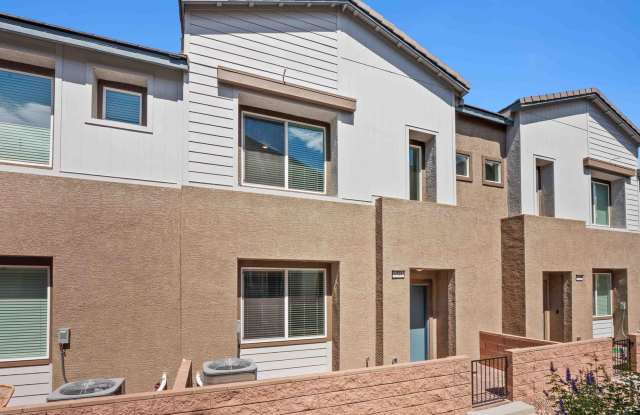 Henderson!! New Townhouse!!! Gated!! New pool to be Built!! Tankless Water Heater!! Two Masters!! Balcony!!