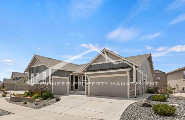 Photo of Elegant Ranch-Style Home with Main Floor Primary Bedroom with 3-Car Garage and Finished Basement in Wolf Ranch