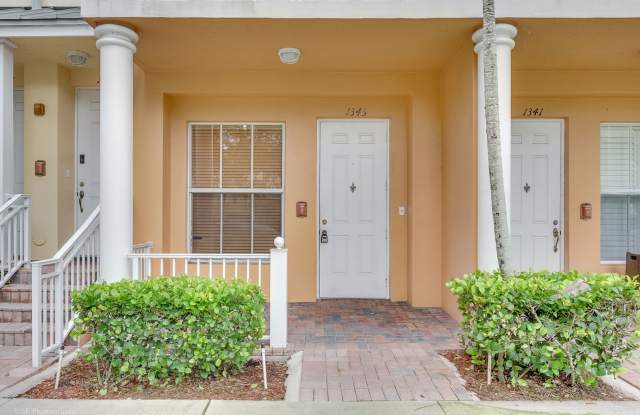 Charming spacious 1 bed 1 bath unit in the serene Village at Sailboat Bend.