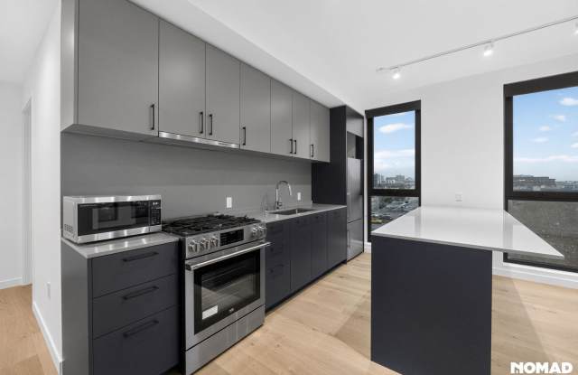 Act Fast: Luxury SoMa Corner Unit w/ EV Parking  Views