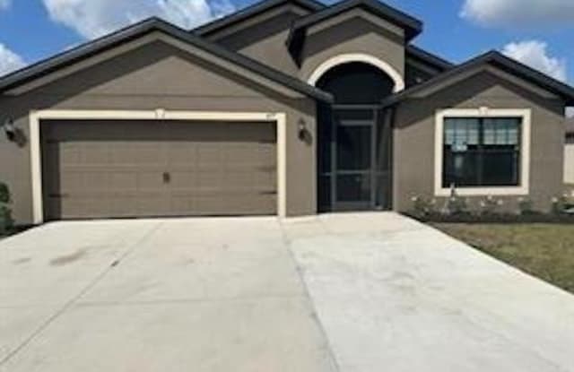 427 Shadow Lakes Drive - 427 Shadow Lakes Drive, Lehigh Acres, FL 33974