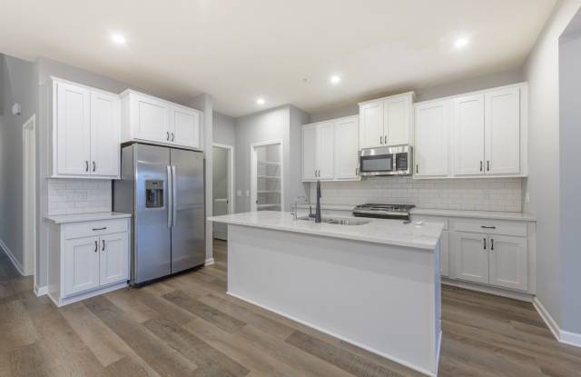 Photo of Awesome maple grove 5 bed 4 bath townhome! Pond views, 2 years old!