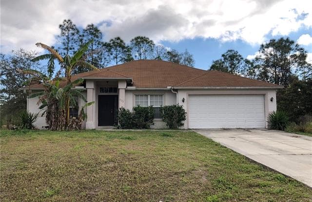 835 Downer AVE S - 835 Downer Avenue South, Lehigh Acres, FL 33974