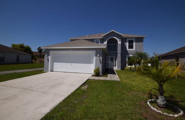 4 Bedroom, 2.5 Bath House with 2-car Garage For Rent at 2120 Marisol Loop, Kissimmee, FL 34743 photos photos