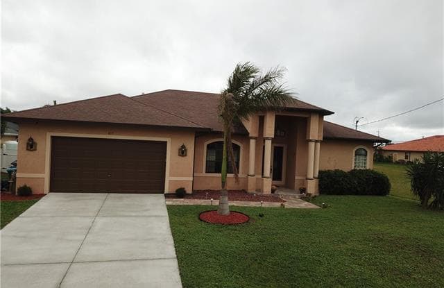 437 NW 37th PL - 437 Northwest 37th Place, Cape Coral, FL 33993