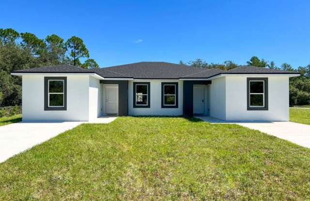 Discover Elegance in Poinciana's Stunning 3-Bedroom Duplex Home