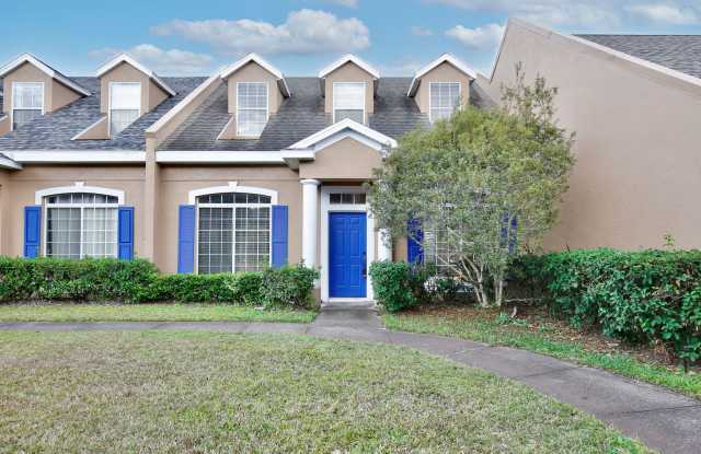 Charming 3/2.5 Spacious Townhome with a 2 Car Garage in the Gated Community of Island Walk at Meadow - Orlando!