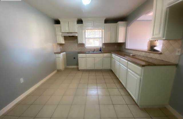 6661 GARDEN WOODS AVE.