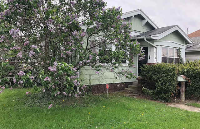 Photo of 3 Bed 1 Bath with Fence + 1 Gar Garage + Deck