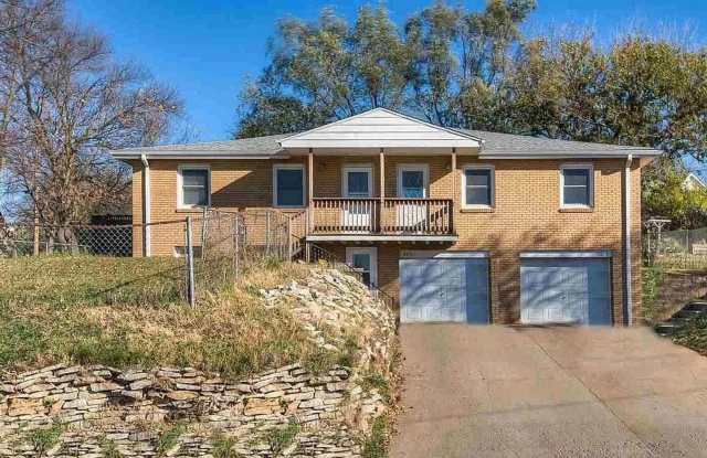 Bright & Spacious 3-Bedroom Duplex Unit on Large Corner Lot with Wood Floors & Garage!