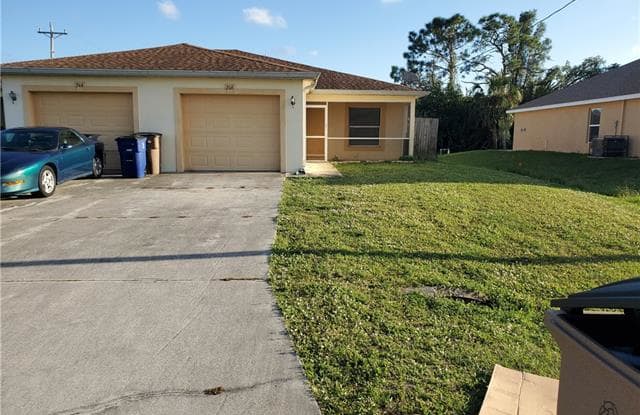 246 Peerless ST - 246 Peerless Cir, Lehigh Acres, FL 33936