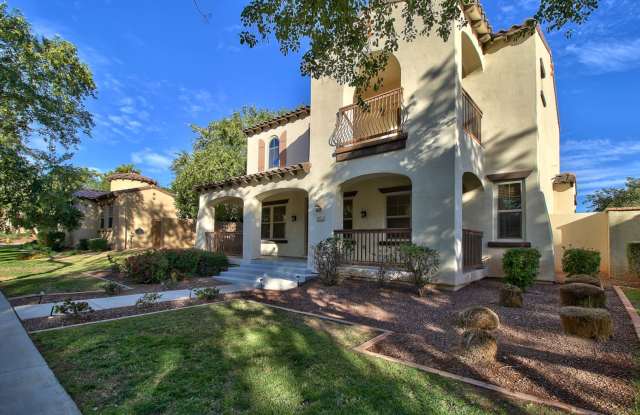 Mission-style home in Main Street District of Verrado photos photos