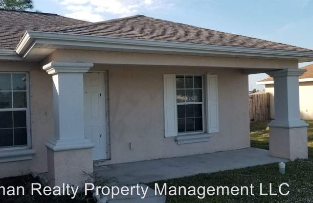 1044 Harwood Ave S - 1044 Harwood Ave S, Lehigh Acres, FL 33974