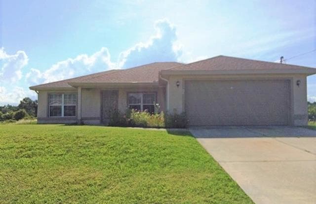 917 Hillcrest AVE - 917 Hillcrest Avenue, Lehigh Acres, FL 33974